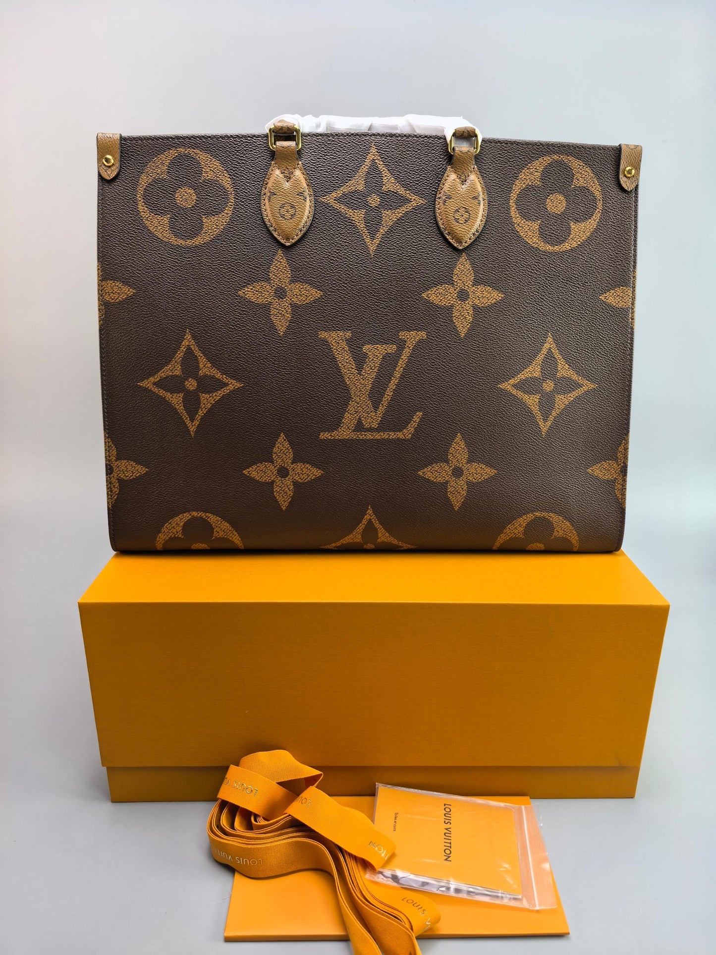 Lv On The Go GM Tote Bag