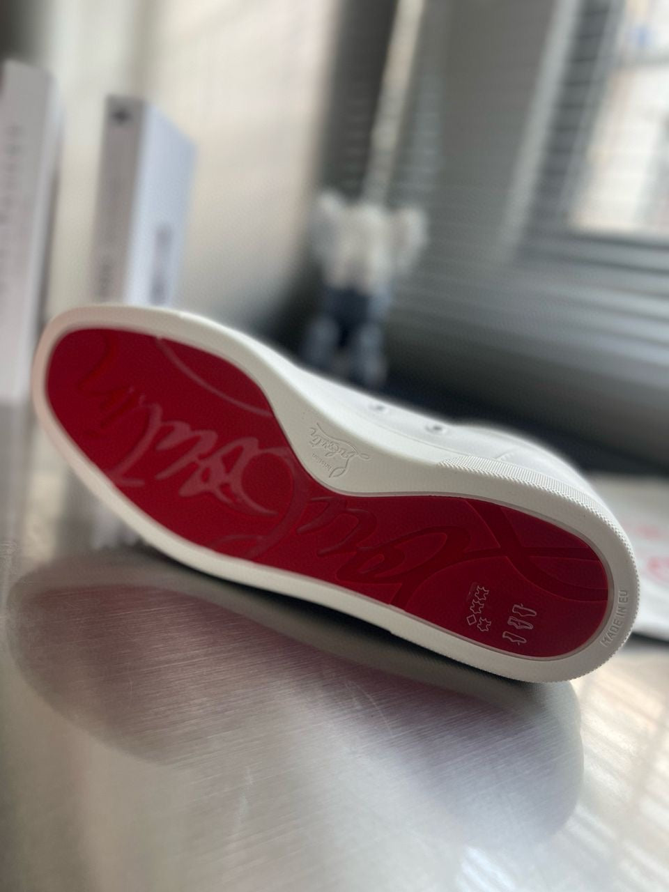 C Louboutin trainers